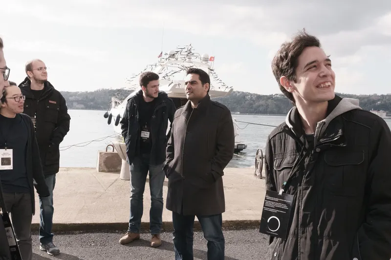 Participants standing by the Bosphorus at Beykoz Kundura