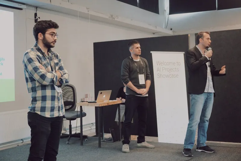 A team presenting their project at the AI Projects #2 Showcase